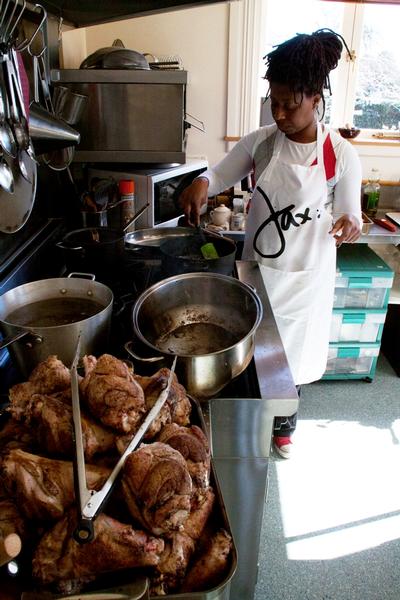 Jax preparing dinner in the Pen-y-bryn kitchen